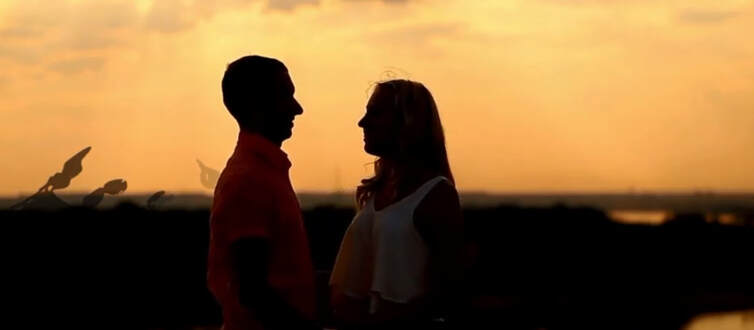 Silhouette of couple in love outdoor scene