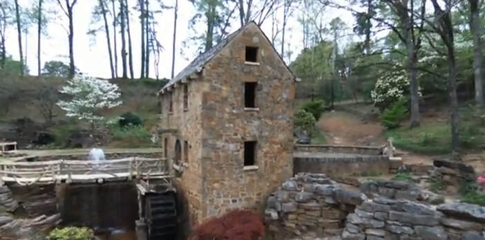 An Old Millhouse and mill wheel
