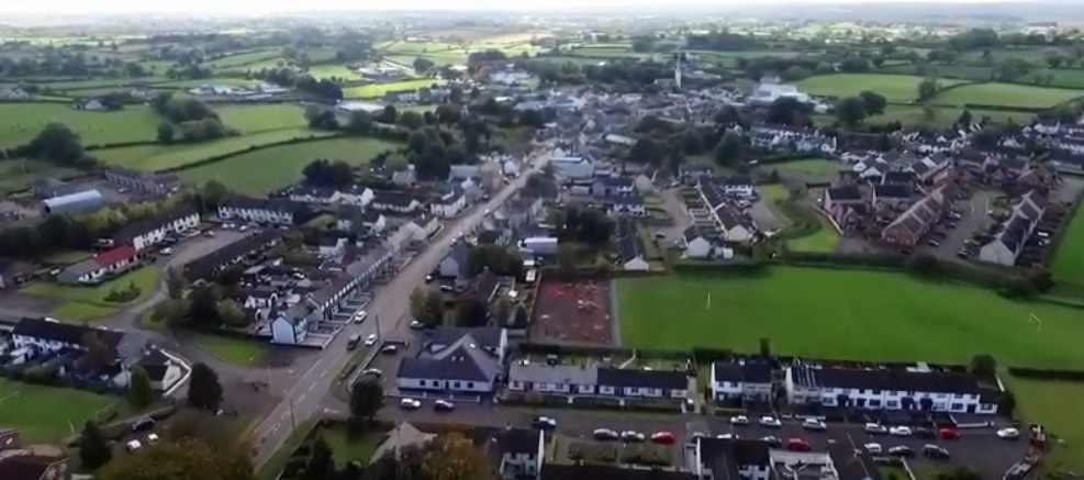 Bellaghy villagh Derry from above showing shops houses and surrounding fields