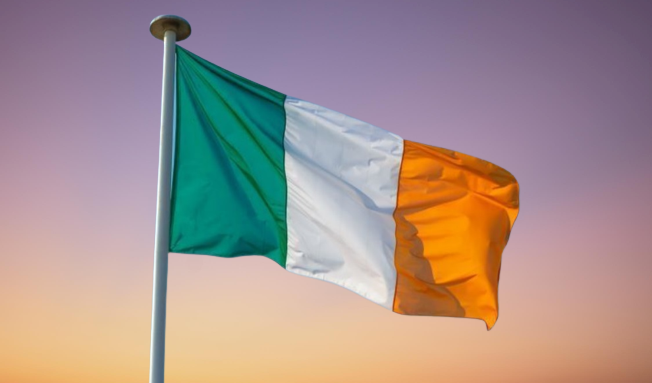 Irish flag flying at dawn