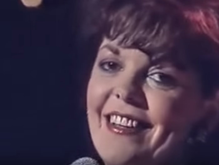 Susan McCann singing on stage